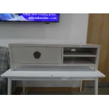 White painted entertainment unit with double door cupboard and shelf to the side