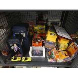 Cage containing Dr Who phone boxes plus Vanguard, Matchbox and other cars