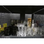 Cage containing wine glasses and tumblers