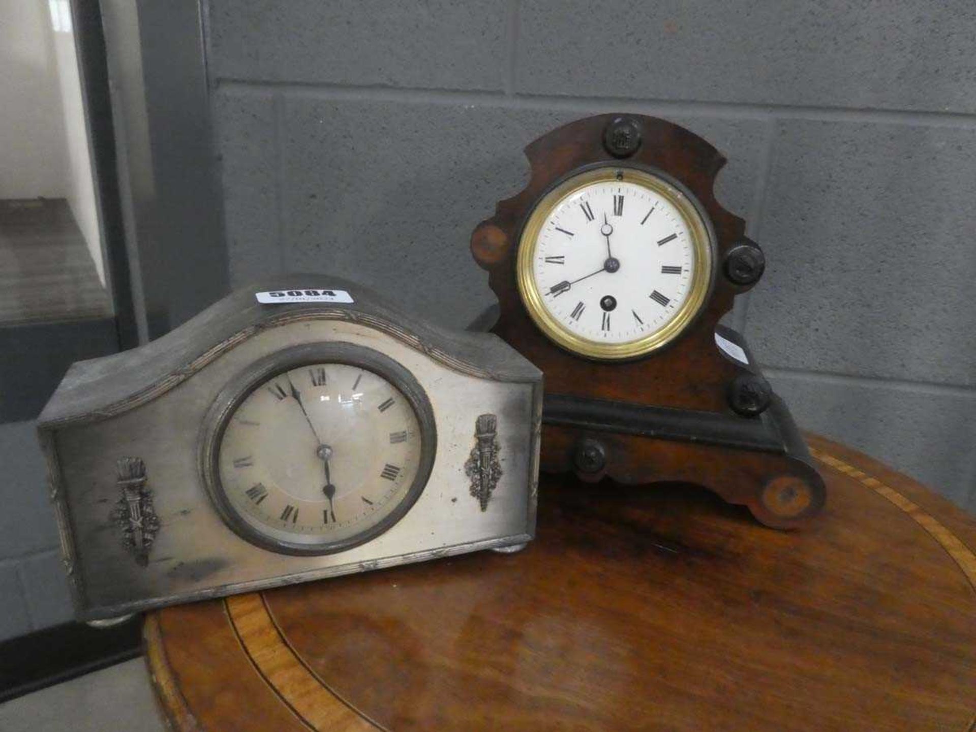 Two dome topped mantel clocks