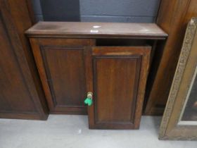 Small double door oak display cabinet