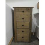 Pair of narrow pine finished chest of 5 drawers