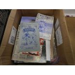 Box containing football, baseball and other programmes