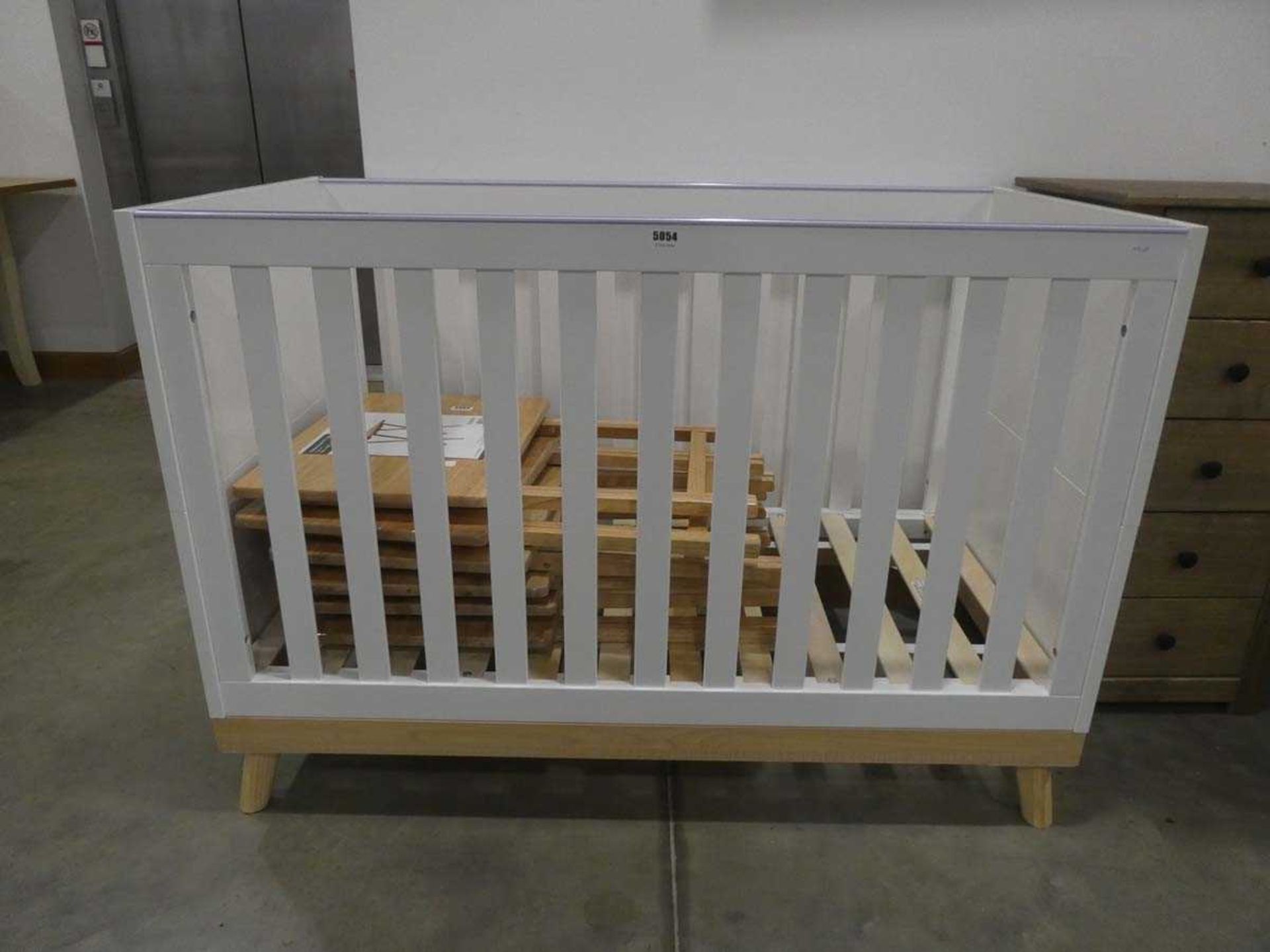 White painted child's cot