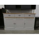 Pine and painted 3 drawer side board with cupboards under