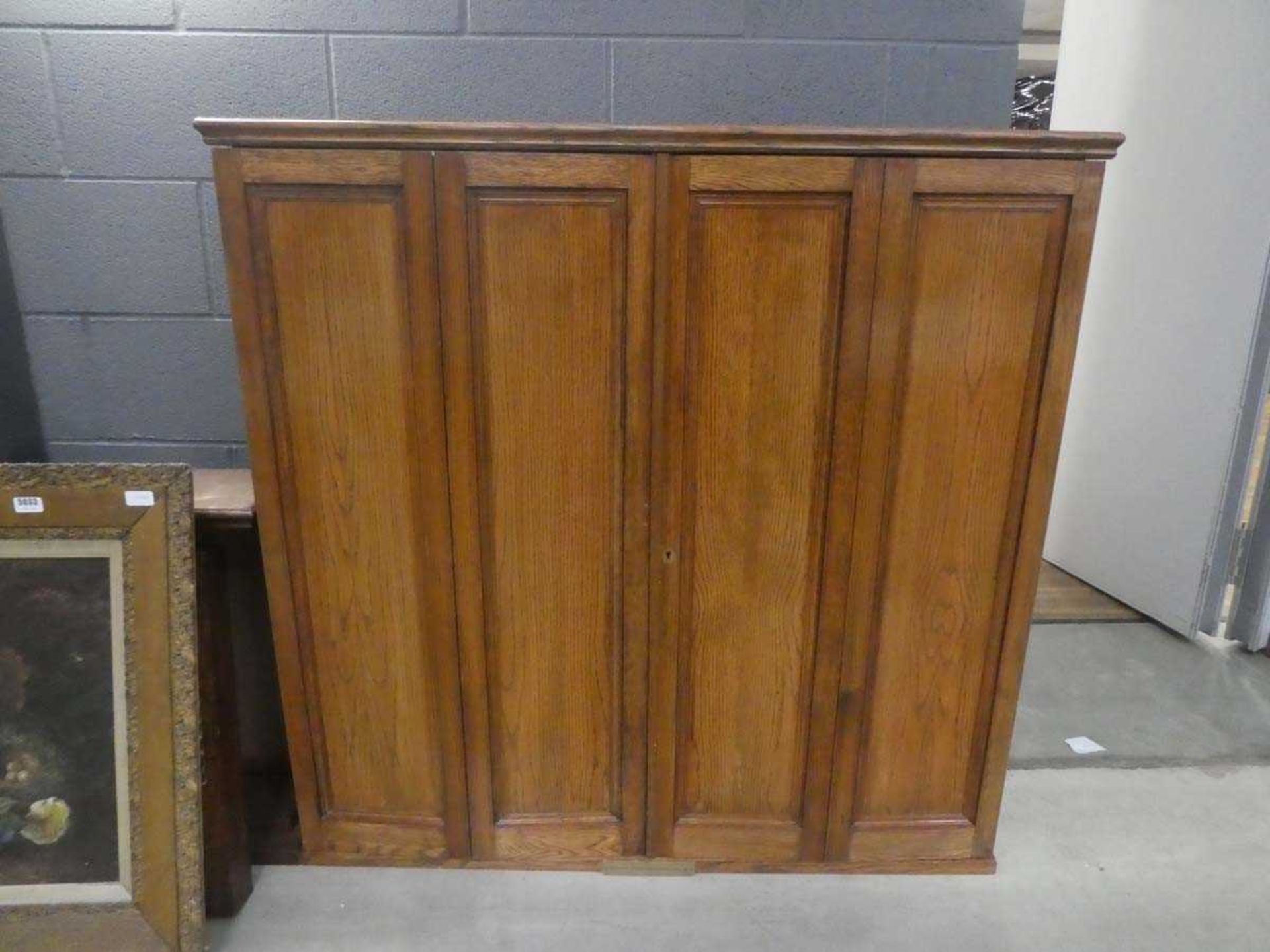 Large double door oak display cabinet