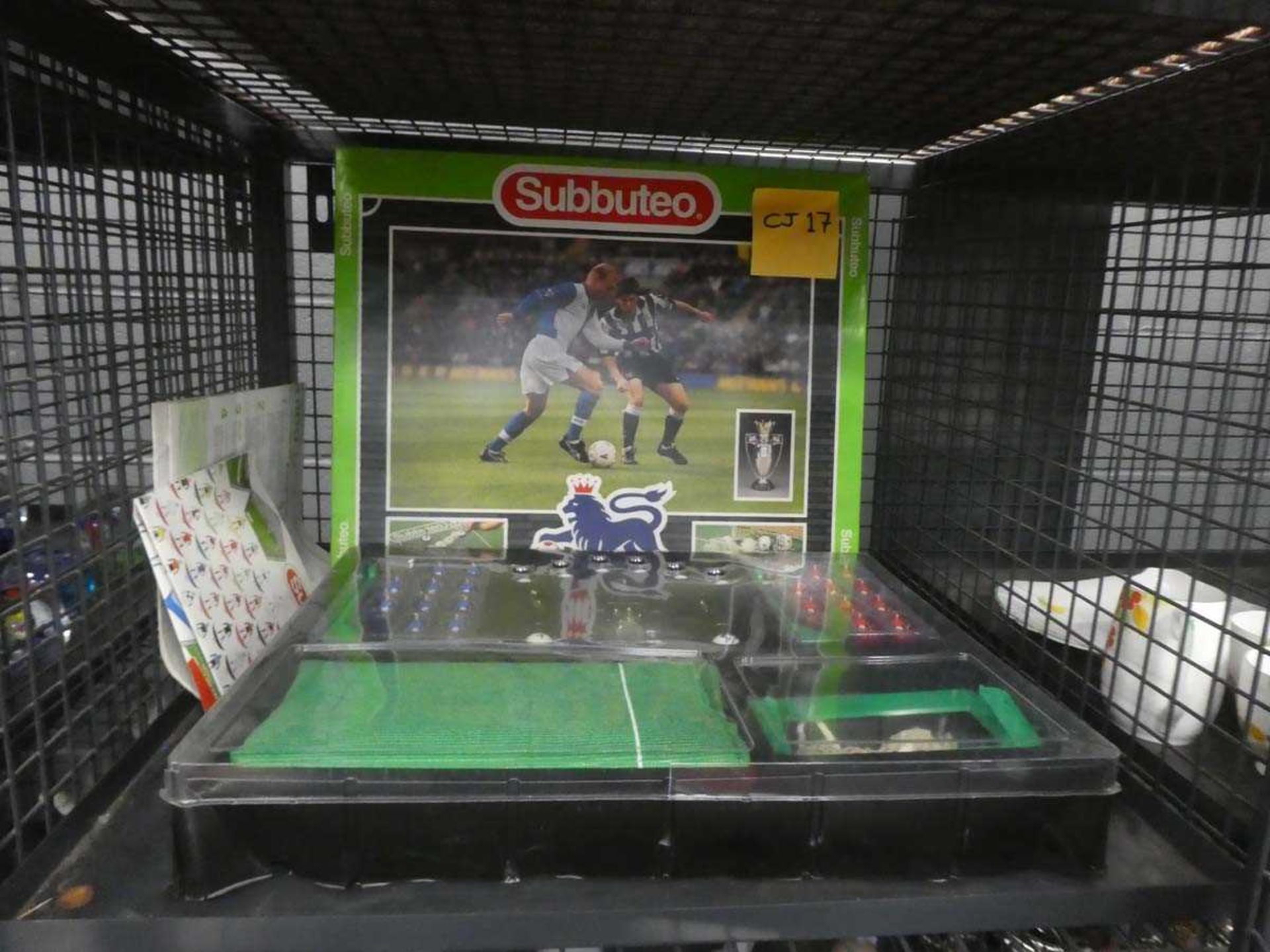 Cage containing a Subbuteo set