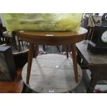 Circular teak side table