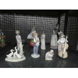 Cage containing 7 x Neo and Lladro figures plus a glass vase