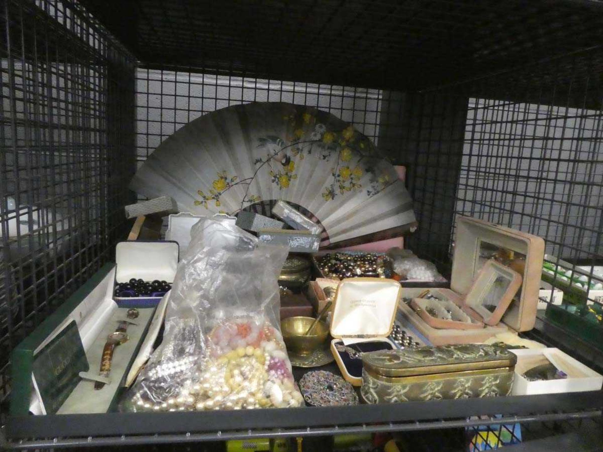 Cage containing oriental fan. wrist watch and costume jewellery