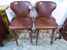 Modern pair of brown leatherette upholstered bar stools with brass studded detail