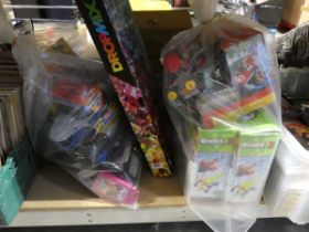 2 bags of mixed toys incl. Monster Jam truck, Soak & Splash ball, Mario Kart, etc.