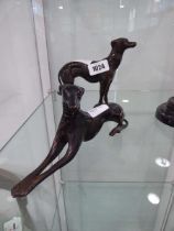 Pair of bronze finish greyhounds, 1 standing, 1 prone