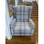 Modern grey check upholstered wing back armchair