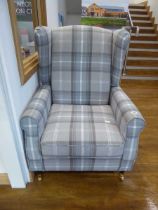 Modern grey check upholstered wing back armchair