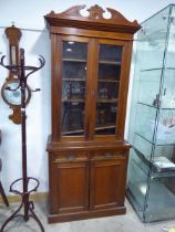 Edwardian mahogany bookcase with cupboard storage below