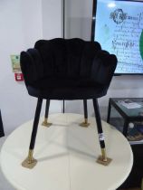 Modern black suede upholstered shell type dining chair on black tapered supports