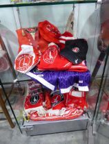 Large assortment of Charlton Athletic themed memorabilia including various replica shirts spanning