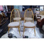 Set of 4 (2+2) ash and elm Ercol stick back dining chairs with natural coloured detachable cushions