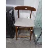 Single wooden bar height stool on 'Wishbone' type frame with natural coloured wipeable seat