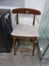 Single wooden bar height stool on 'Wishbone' type frame with natural coloured wipeable seat