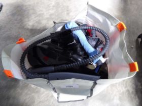 +VAT Bag containing a Polti hand held vacuum cleaner