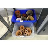 2 crates containing a quantity of mainly terracotta and ceramic pots