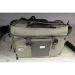 Airflo fishing bag containing a compass and miscellaneous fishing items