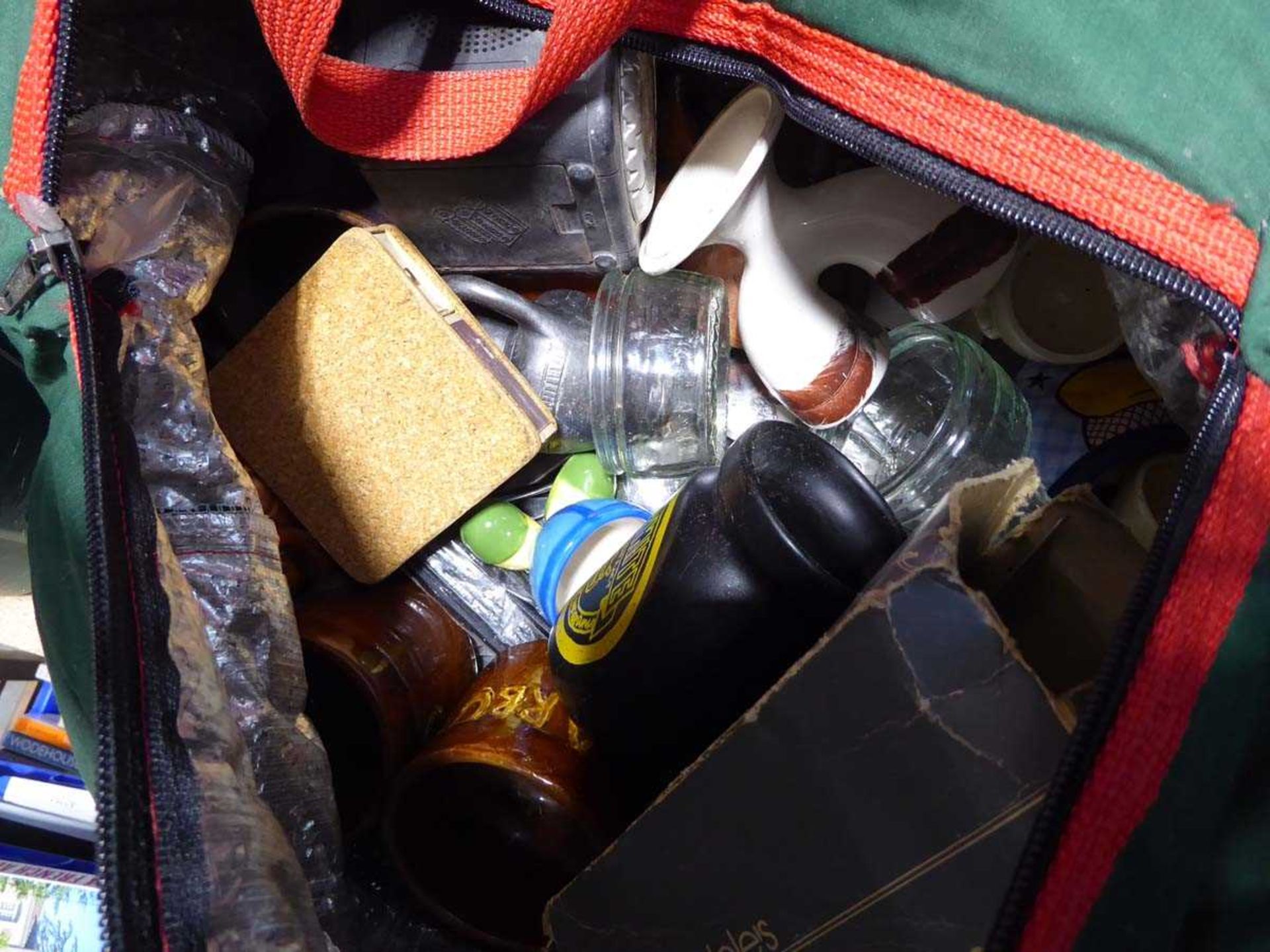 Green bag containing various mugs incl. Marmite, Cheddar Gorge, various pieces of cutlery,