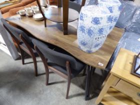 Wood effect table on splayed black supports together with 4 grey upholstered dark wood framed dining
