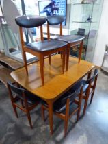 Teak effect extending dining table with 6 matching black vinyl upholstered dining chairs