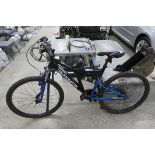 Muddyfox Recoil 26 mountain bike in black and blue