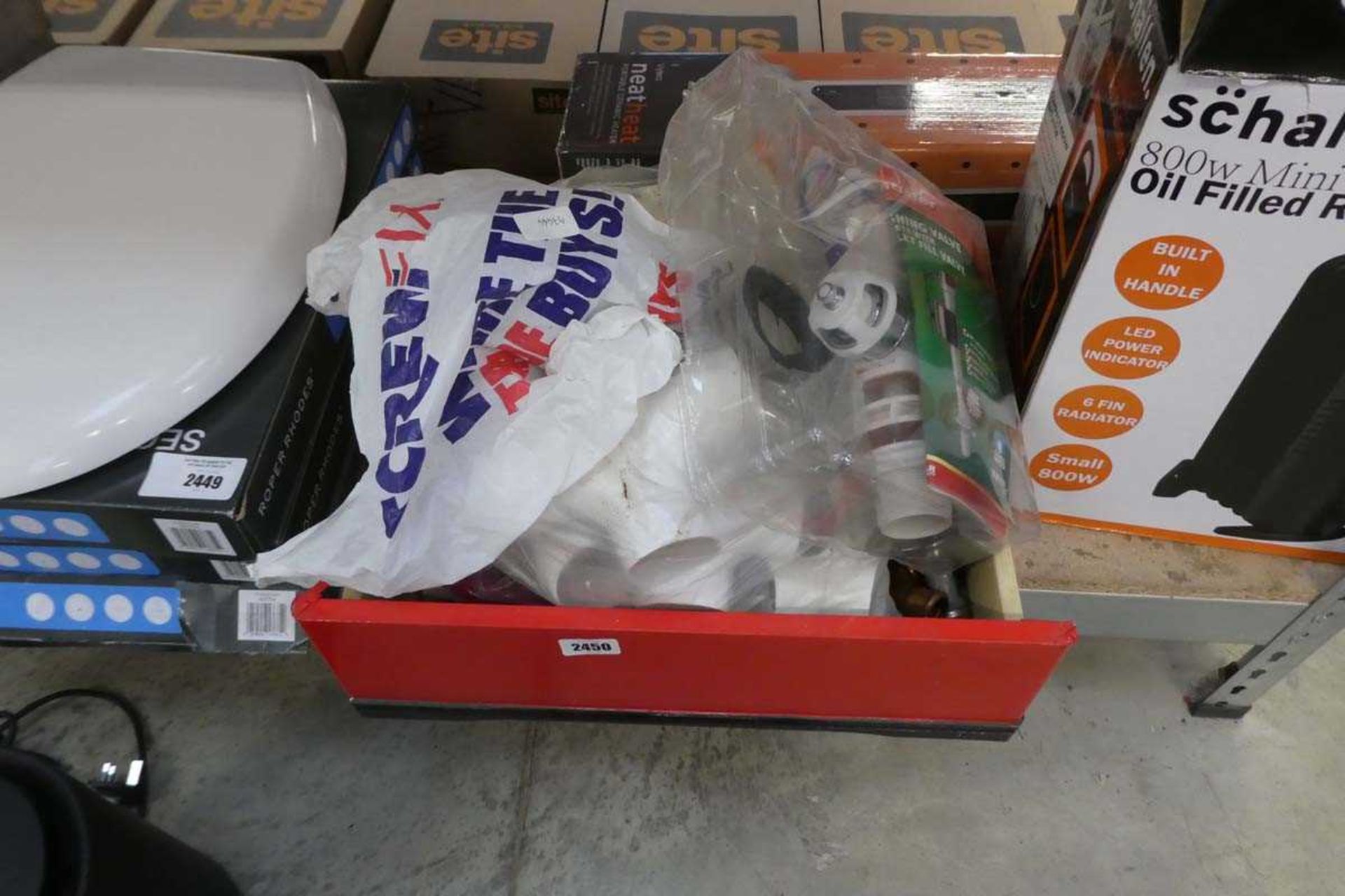 Crate of mixed plumbing items