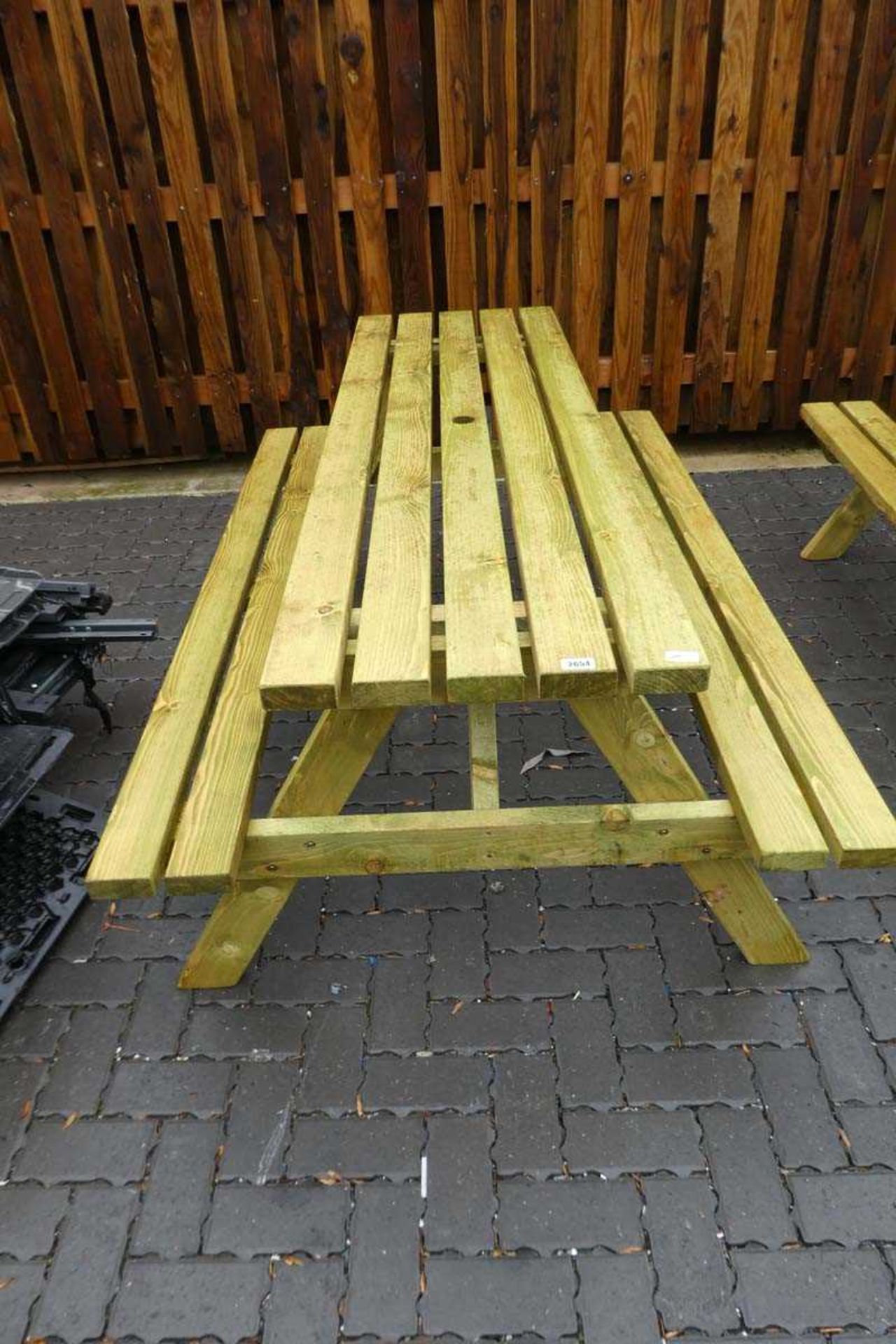 Wooden slatted picnic bench