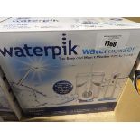 +VAT Waterpik water flosser, boxed