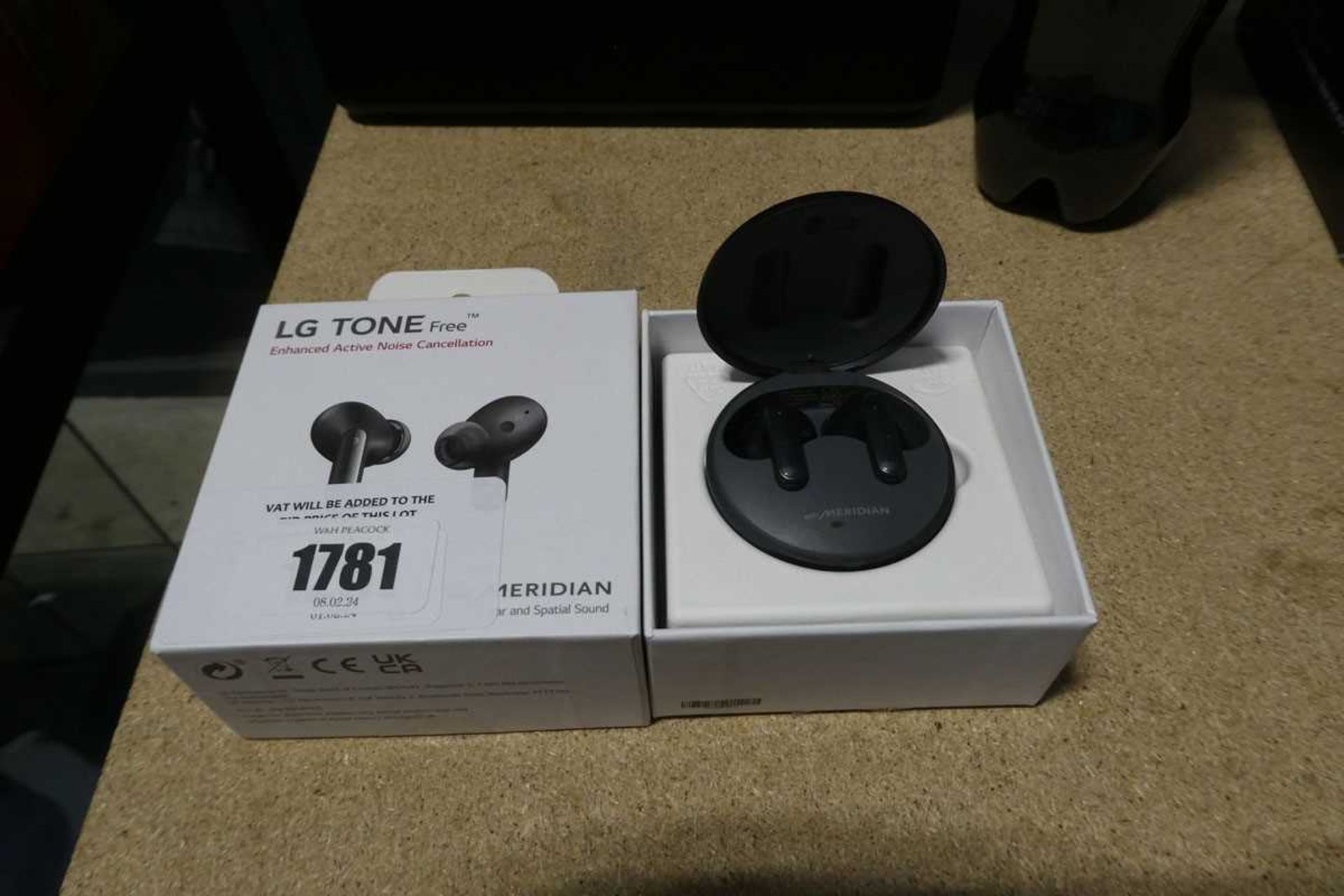 +VAT LG Tone free ear buds with charging case.