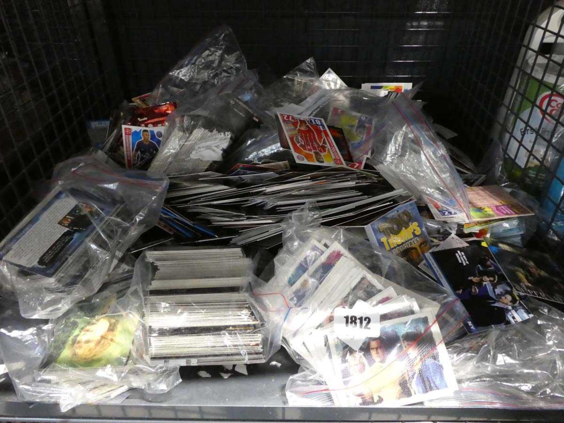 Cage containing various trading cards, including Star Trek. football etc.