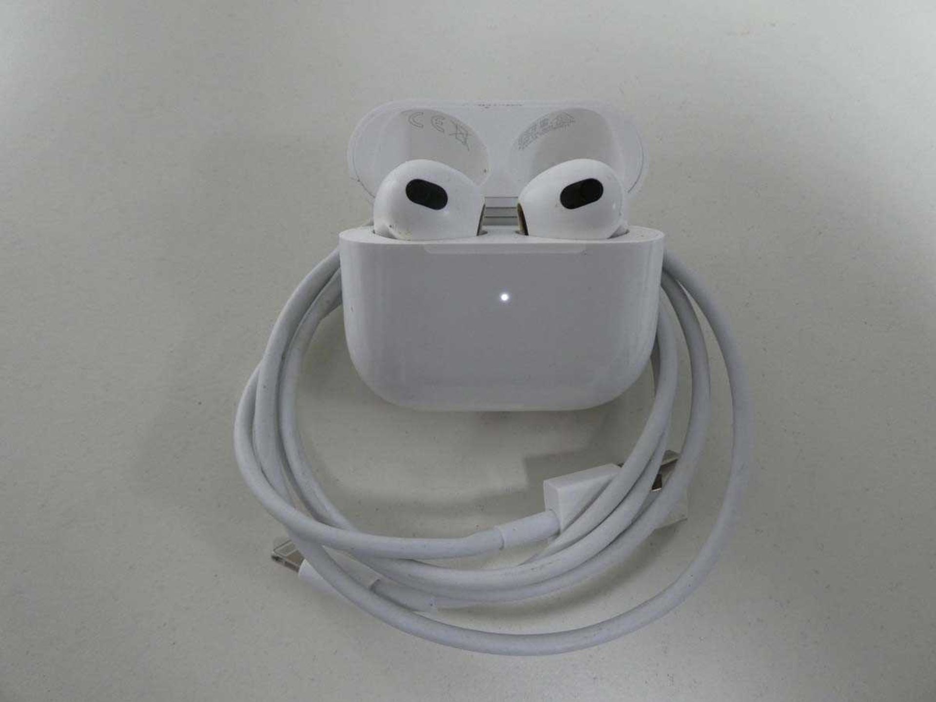 +VAT Unboxed pair of Apple AirPods with charging case and cable