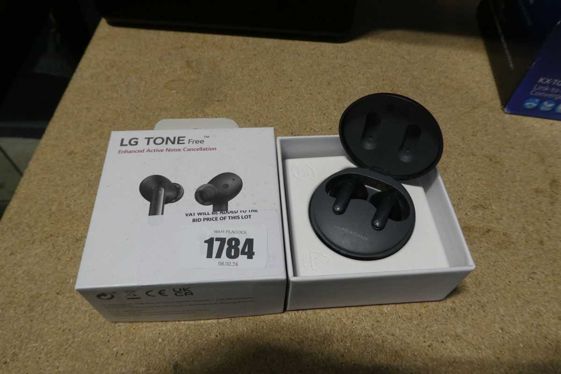 +VAT Boxed pair of LG Tone Free ear buds with charging case and cable