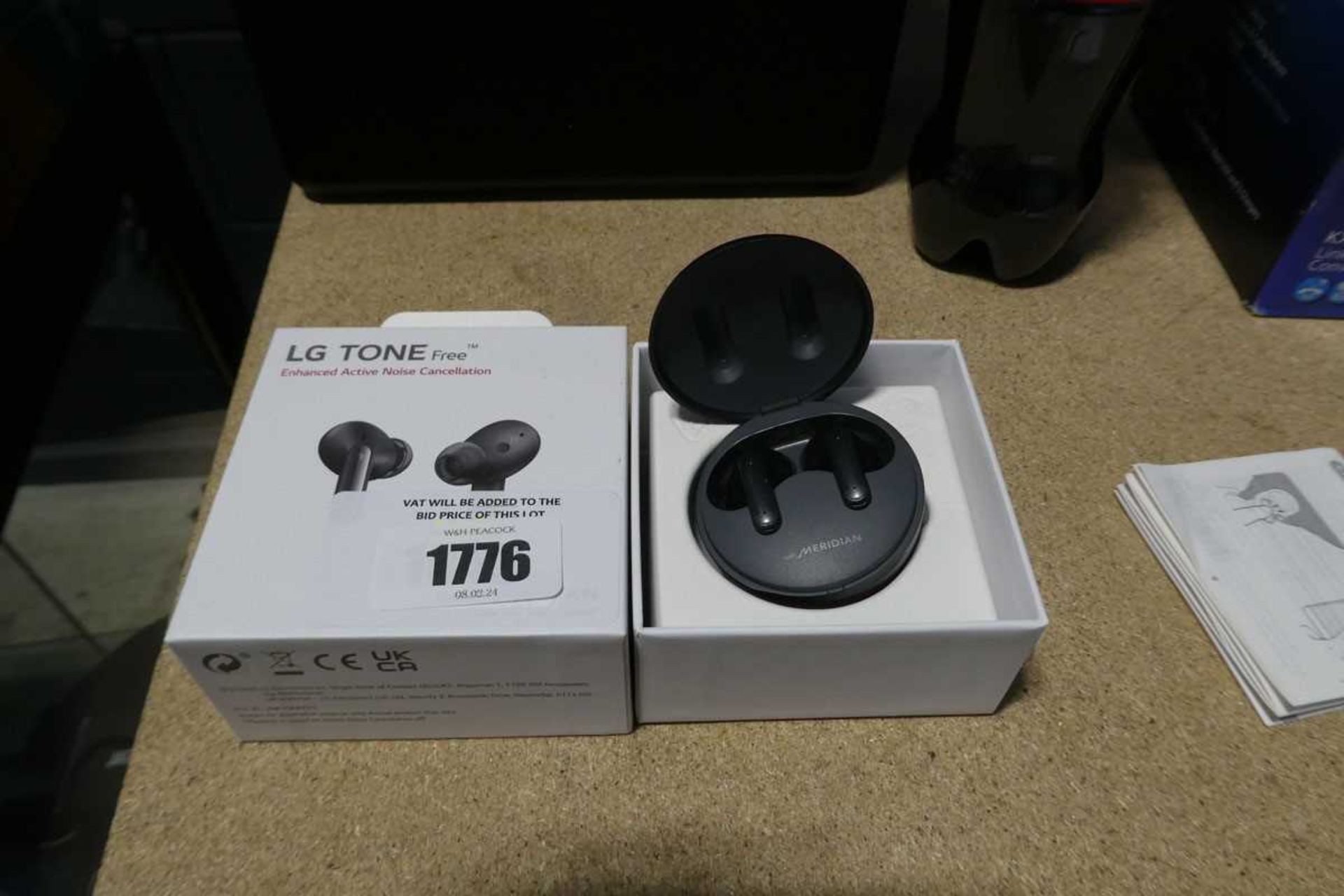 +VAT Boxed pair of LG Tone Free ear buds with charging case and cable