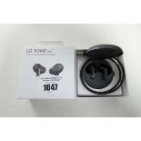 +VAT Boxed pair of LG Tone Free ear buds with charging case and cable