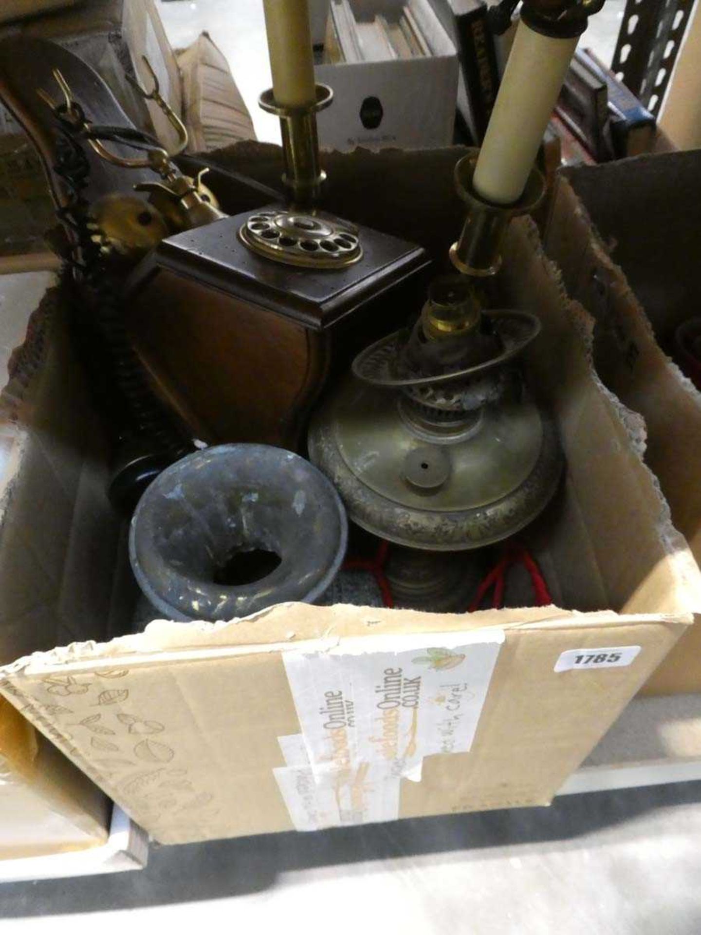 Box containing a vintage style telephone, pair of brass lanterns, Asian religious statue,