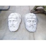 2 concrete mythical mask wall plaques