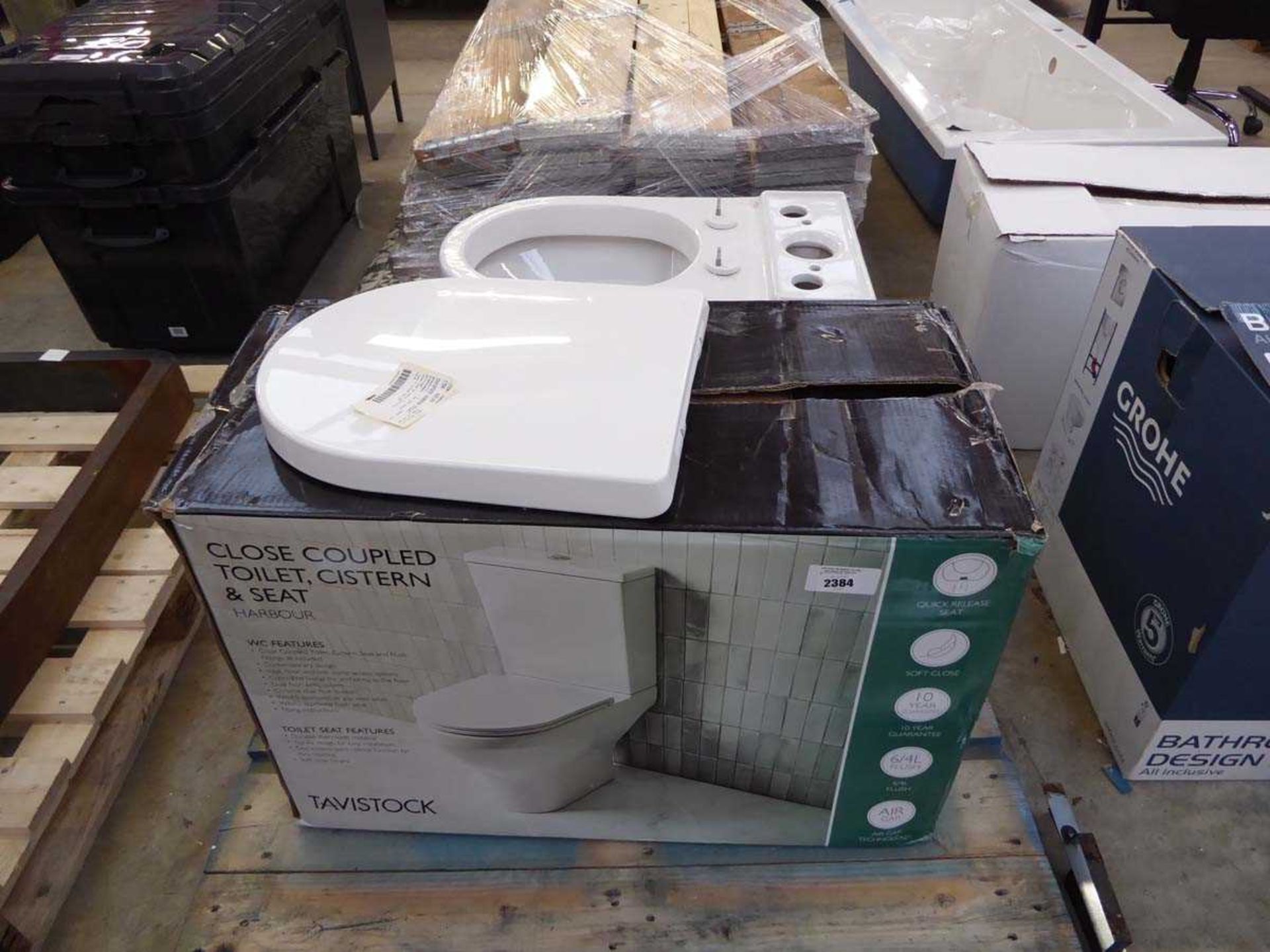 +VAT Boxed Tavistock close coupled toilet cistern and seat set with further unboxed set