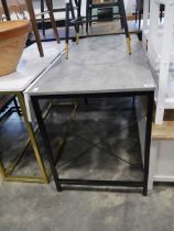 Modern metal framed desk with grey marbled effect surface