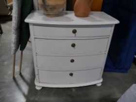 White bow fronted chest of 4 drawers