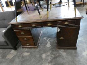 Mahogany twin pedestal office desk with single door cupboard and arrangement of 5 drawers