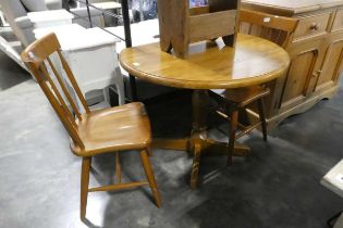 Modern circular drop side breakfast table with 2 matching spindle back chairs