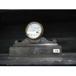 Ornate slate cased mantle clock with key