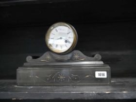 Ornate slate cased mantle clock with key